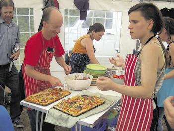 Peace News Summer Camp: helping out with the Veggies catering. Photos: Roy St Pierre