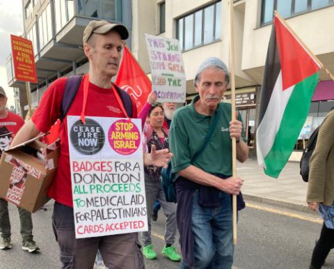 Gabriel Carlyle, PN promotions and finance worker, was the driving force behind PN raising £16,200 this year for Medical Aid for Palestinians by selling badges. Photo: PN